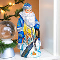 Blue Santa Figurine 7", Hand Painted Wood, Winter Landscape