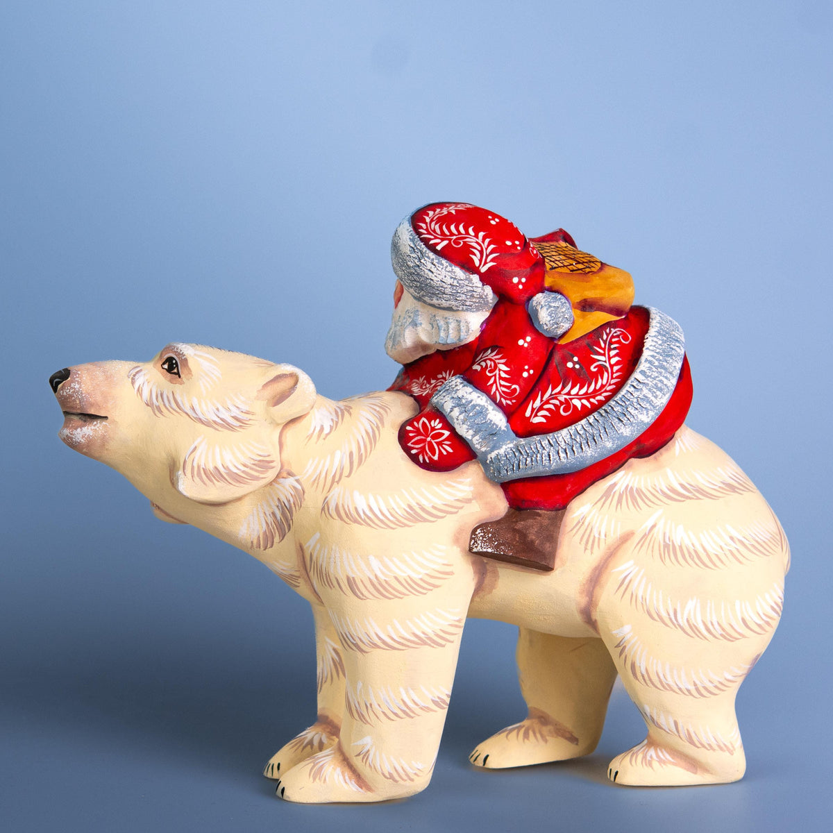 Hand-Carved Wooden Santa Riding Bear Figurine: Christmas Holiday Decor