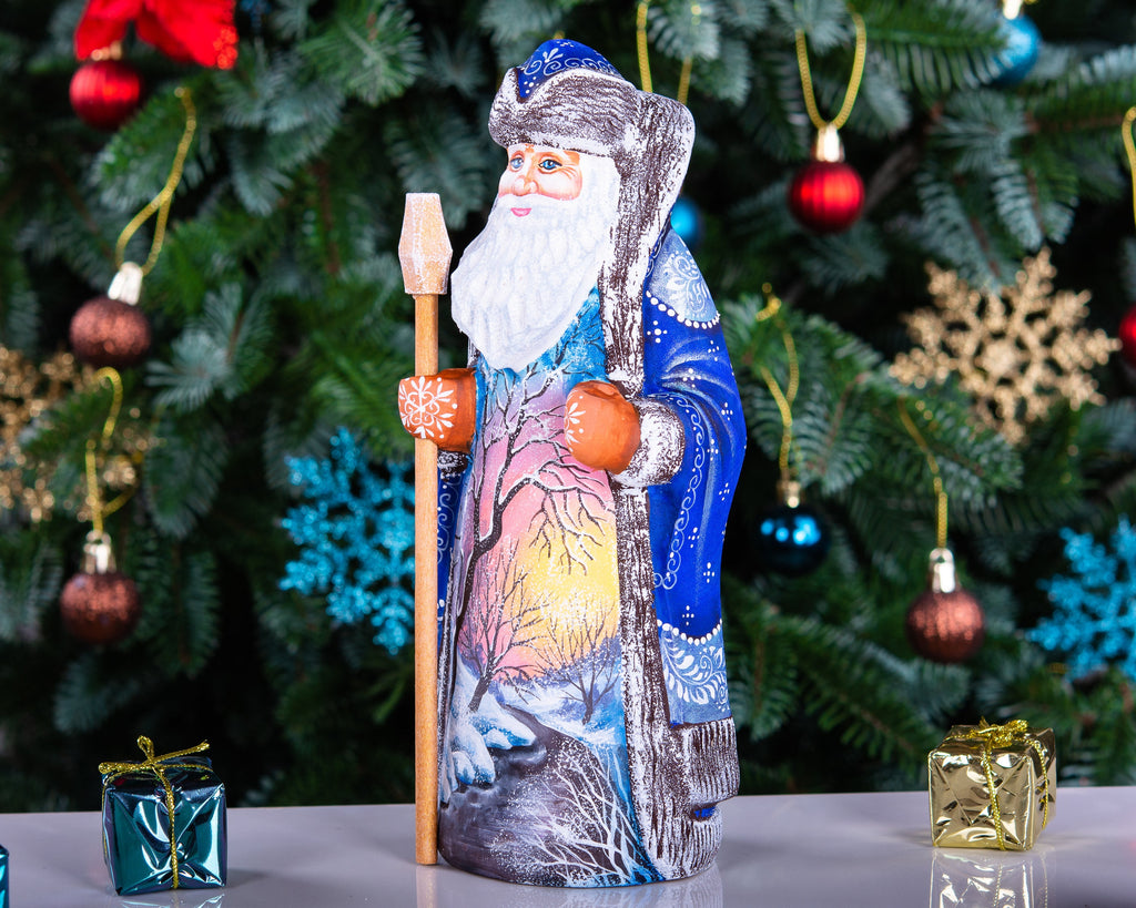 Hand carved wooden Santa figurine 9 inch, blue coat, winter landscape, holiday shelf decor