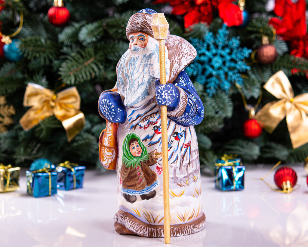 Old-World Santa wood figurine 9 inch, child with winter birds scene, shelf display