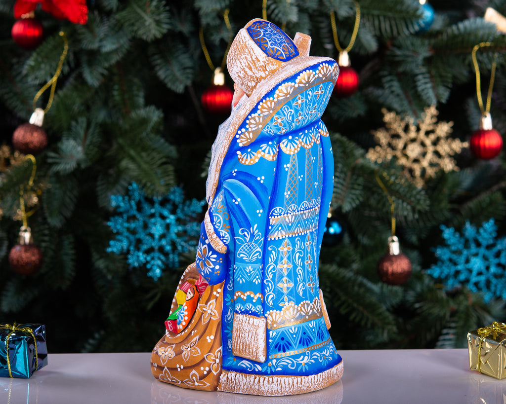 Hand carved blue Santa wooden figurine 9 inch, toy sack, mantel decor