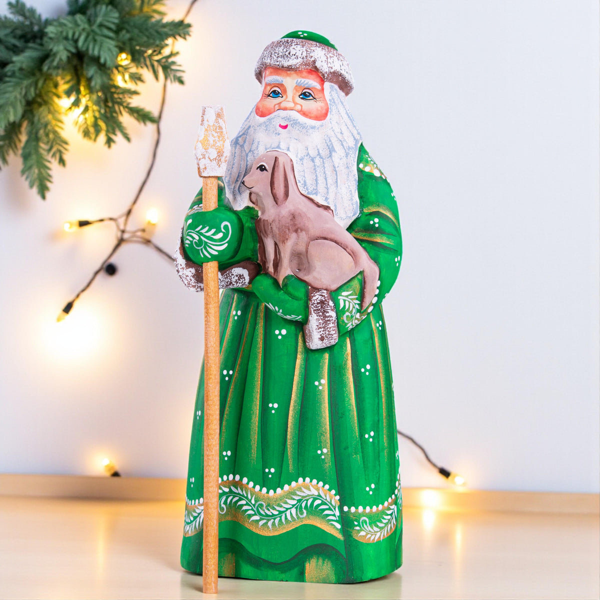 Hand carved Santa wooden figurine 8.7 inch, holding dog, green coat