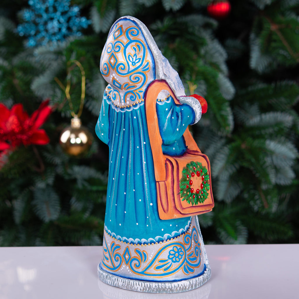 Kris Kringle solid wood figurine 9 inch, teal robe penguins, shelf decor