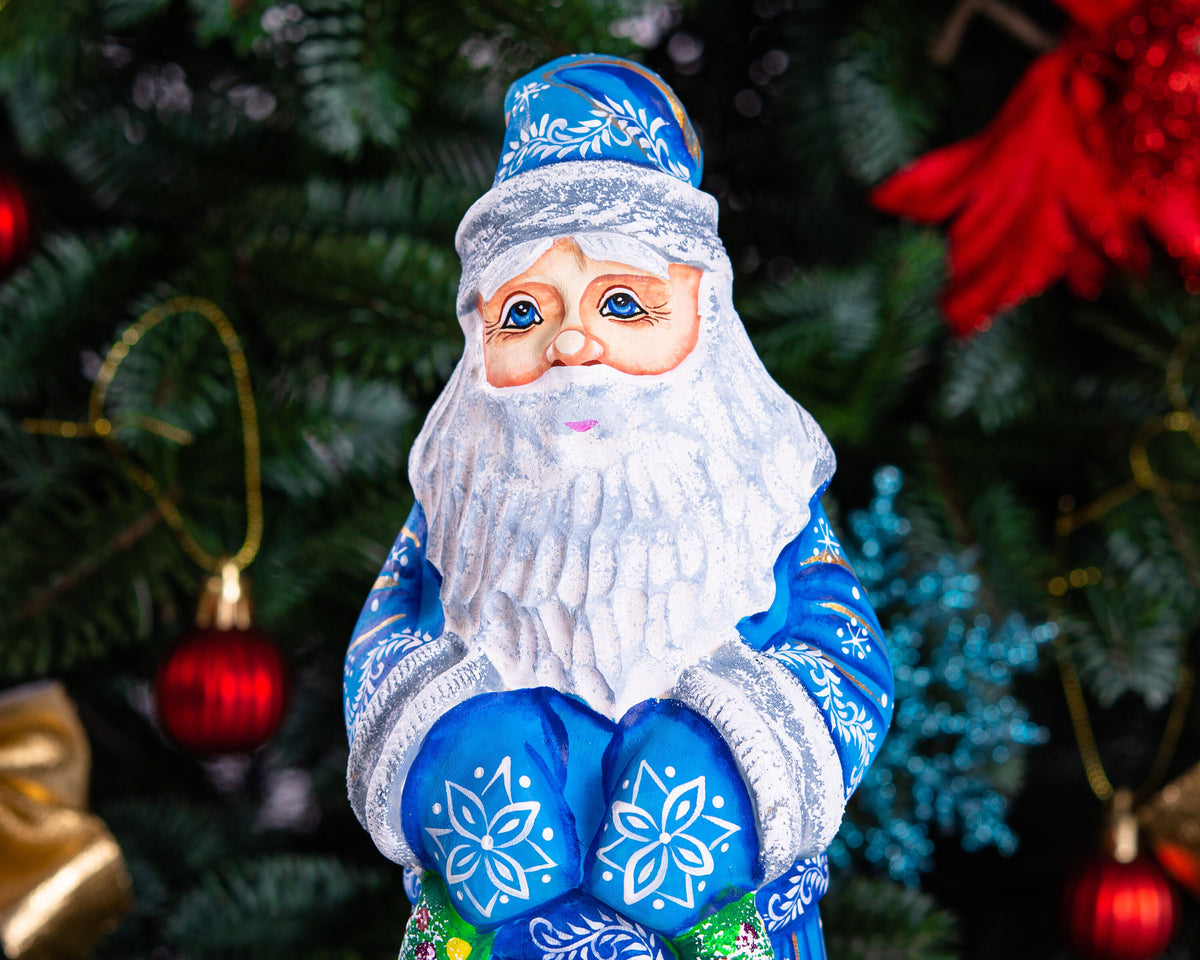 Blue Santa wood carving 11.5 inch, holding wreath, Christmas shelf or mantel decor