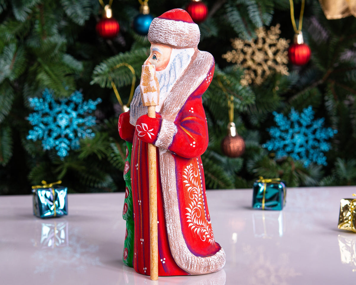 Hand carved wooden Santa figurine 8 inch, holding Christmas tree, holiday shelf decor