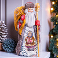 Old-World Santa wooden figurine 9.4 inch, child with doll painting, Christmas mantel decor