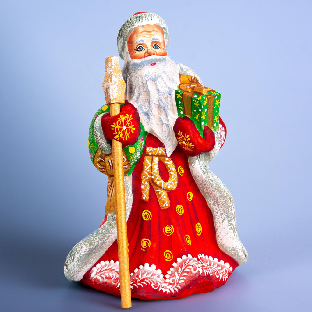 Father Christmas wooden figurine 7 inch, gift in hand, tabletop centerpiece, folk art