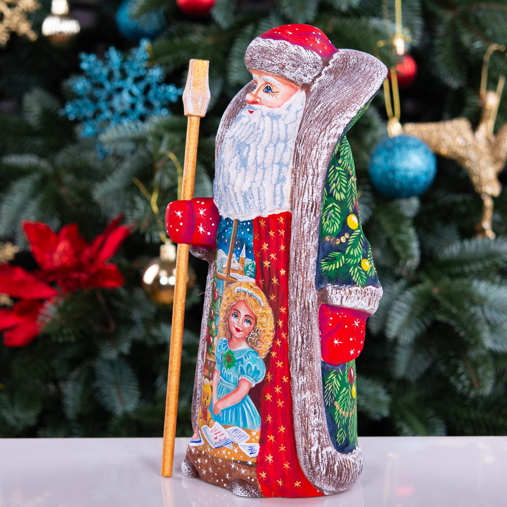 Collectible Santa figurine with staff, girl writing wish list scene, 9.5 inch
