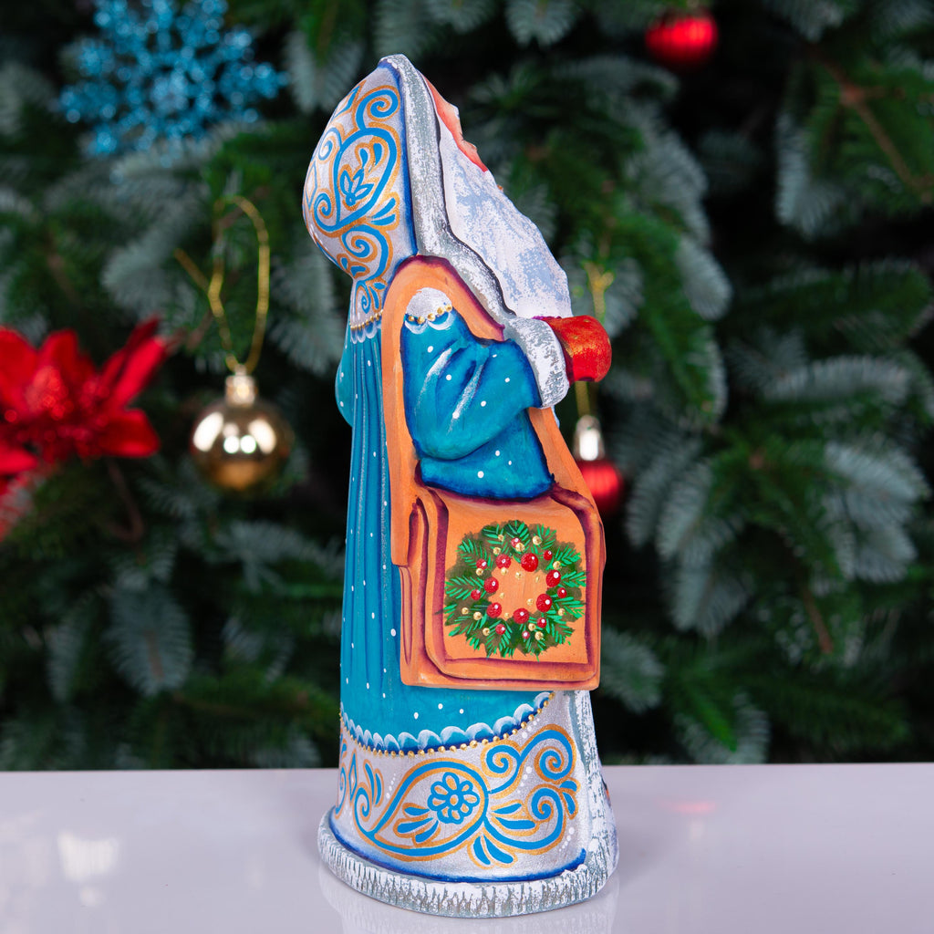 Kris Kringle solid wood figurine 9 inch, teal robe penguins, shelf decor