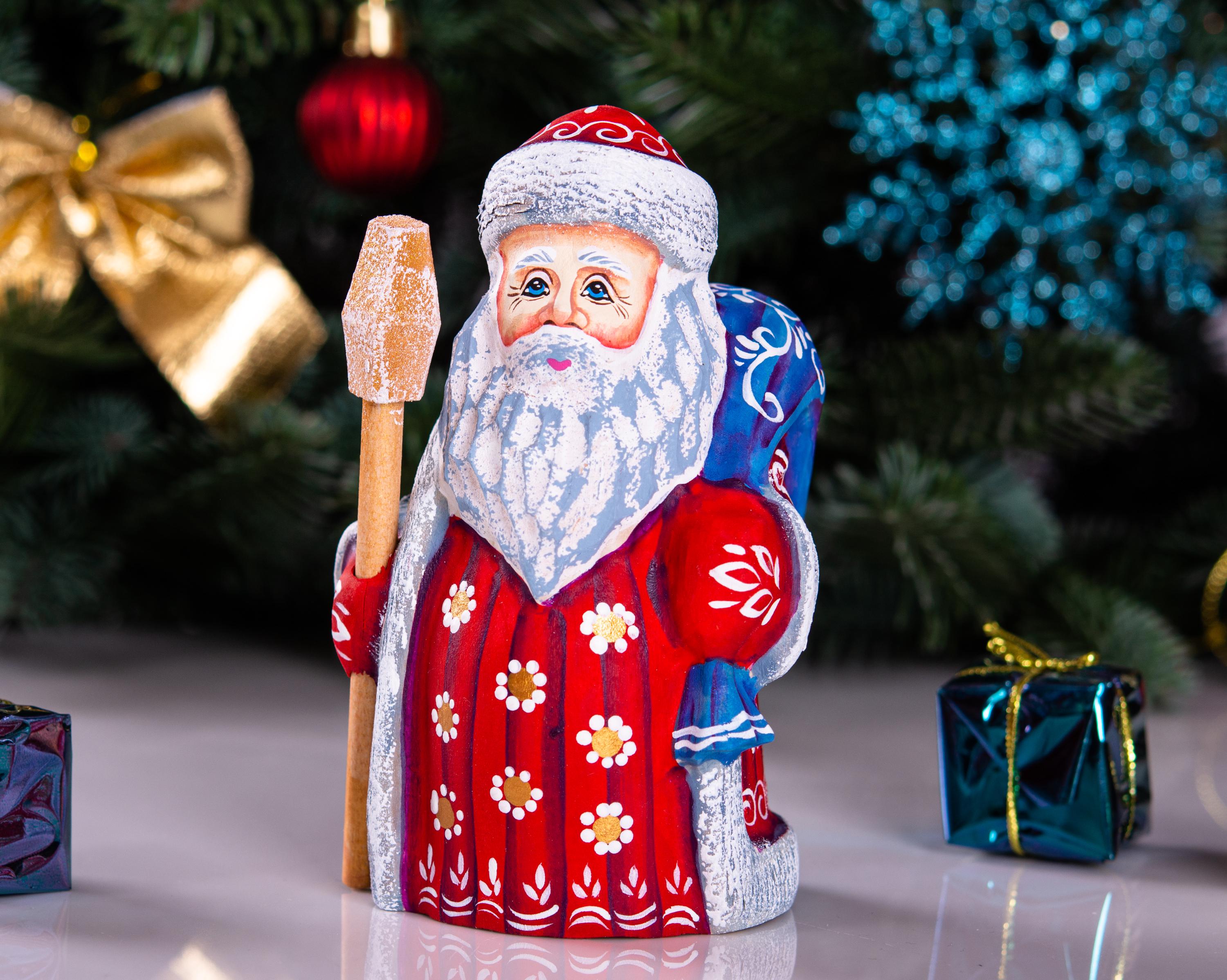 Handcrafted Wooden Santa Figurine: Folk Art Christmas Decor