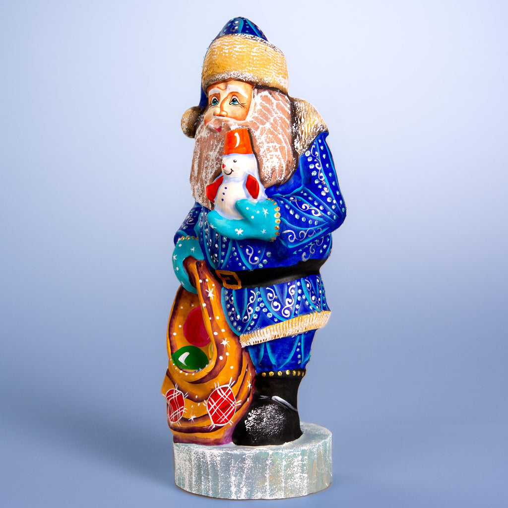 Hand carved blue Santa wooden figurine 10 inch, snowman in hand