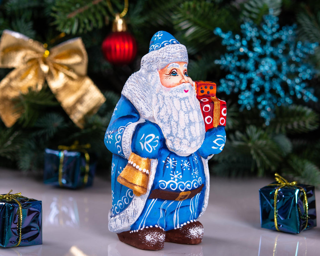 Blue Father Christmas figurine 5.5" with gold bell and stacked gifts