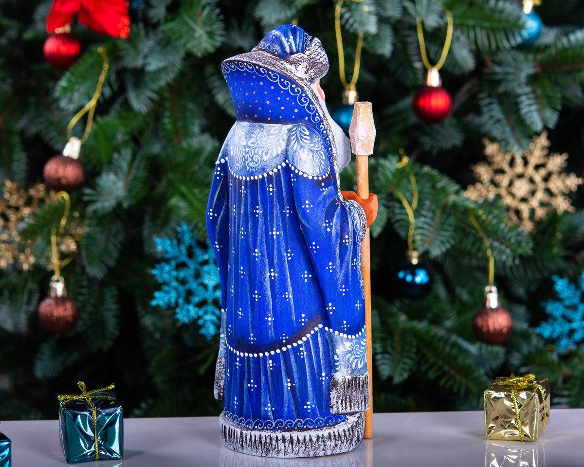 Hand carved wooden Santa figurine 9 inch, blue coat, winter landscape, holiday shelf decor