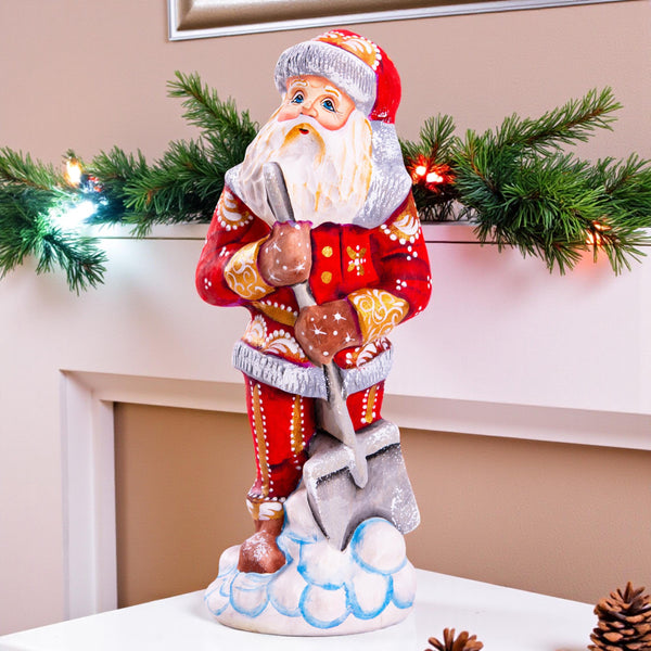 Santa Figurine 7.1″, Hand‑Carved Wood, Snow Shovel, Gold Accents