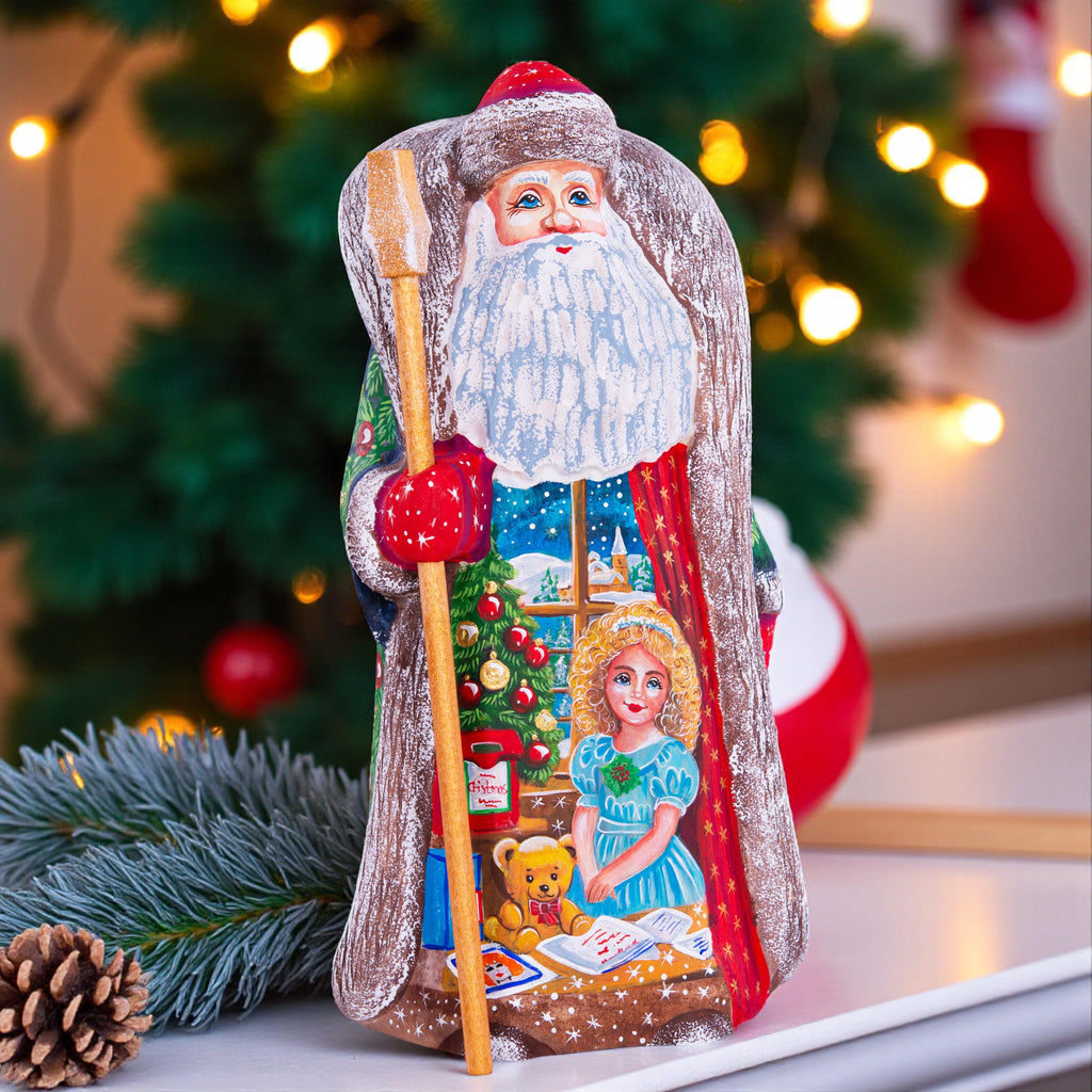 Collectible Santa figurine with staff, girl writing wish list scene, 9.5 inch