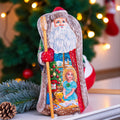 Collectible Santa figurine with staff, girl writing wish list scene, 9.5 inch