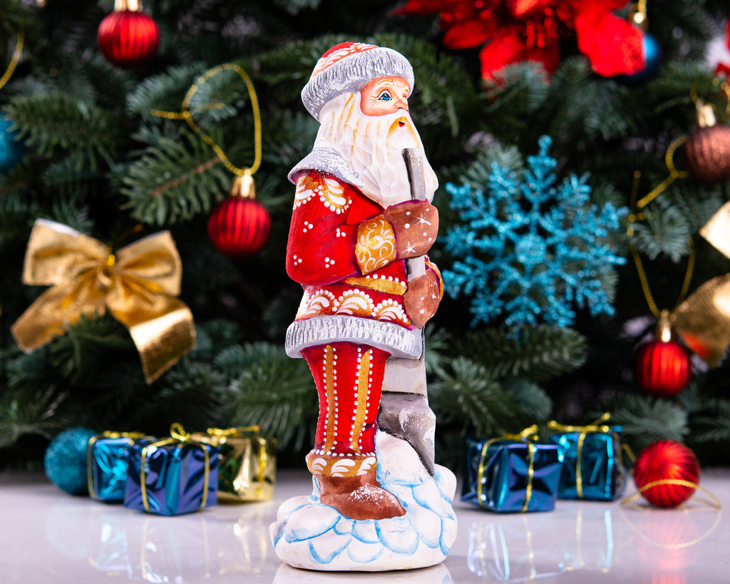 Santa Figurine 7.1″, Hand‑Carved Wood, Snow Shovel, Gold Accents