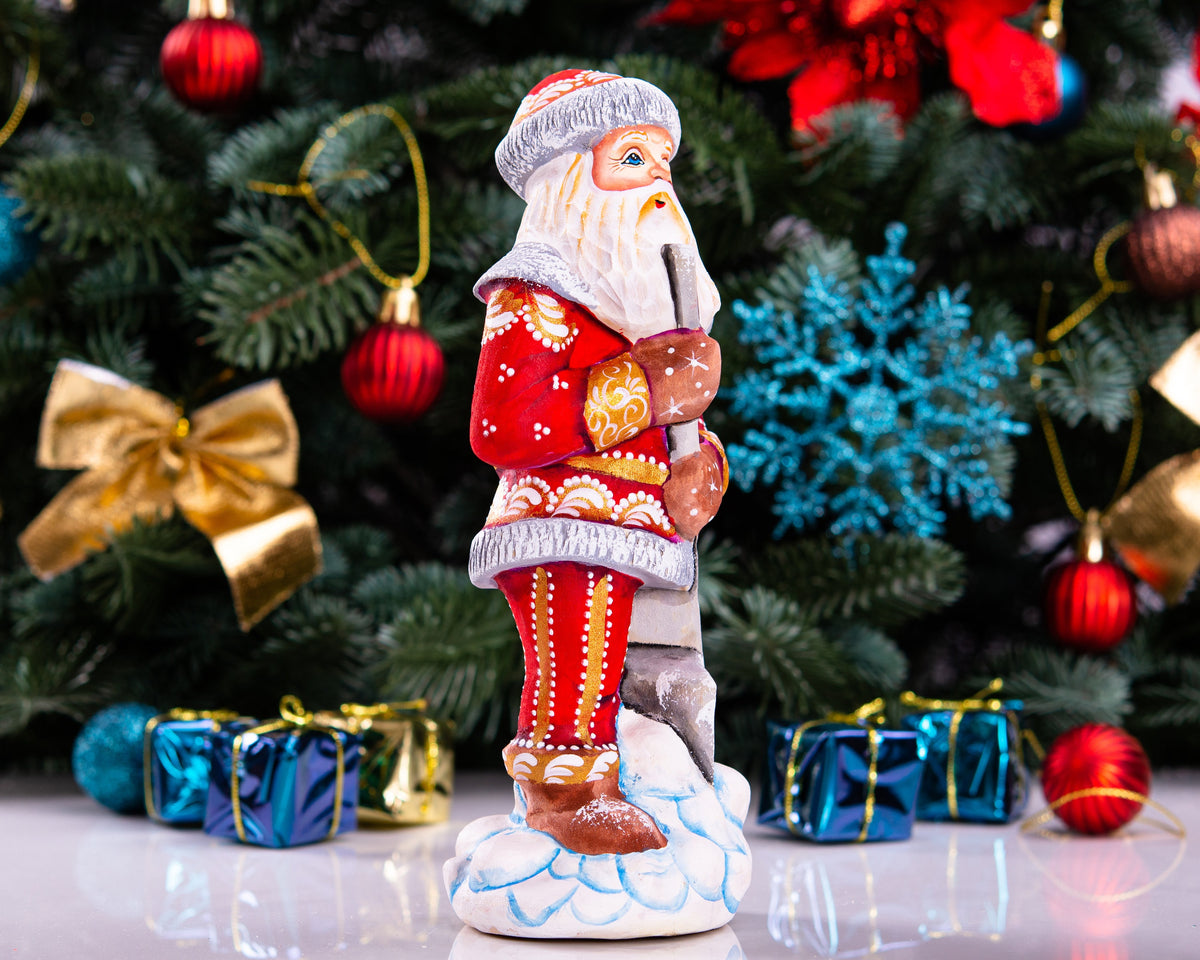 Santa Figurine 7.1″, Hand‑Carved Wood, Snow Shovel, Gold Accents