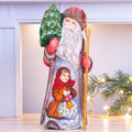 Old world Santa wooden figurine 10 inch, girl with gifts, rustic Christmas home accent