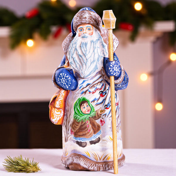 Old-World Santa wood figurine 9 inch, child with winter birds scene, shelf display