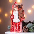 Hand carved wooden Santa figurine 8.5 inch, holding bear, holiday shelf decor
