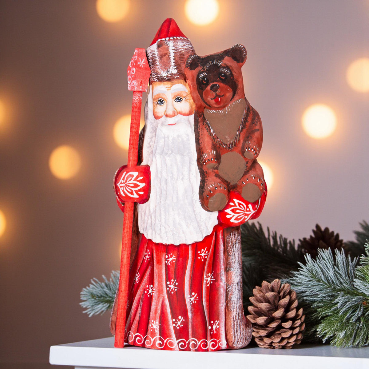Hand carved wooden Santa figurine 8.5 inch, holding bear, holiday shelf decor