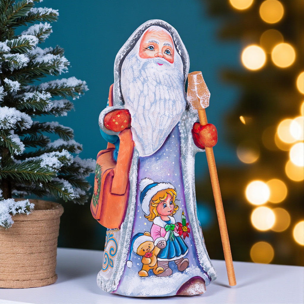 Hand carved Santa statue 9 inch, blue coat, child and teddy
