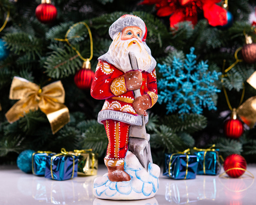 Santa Figurine 7.1″, Hand‑Carved Wood, Snow Shovel, Gold Accents