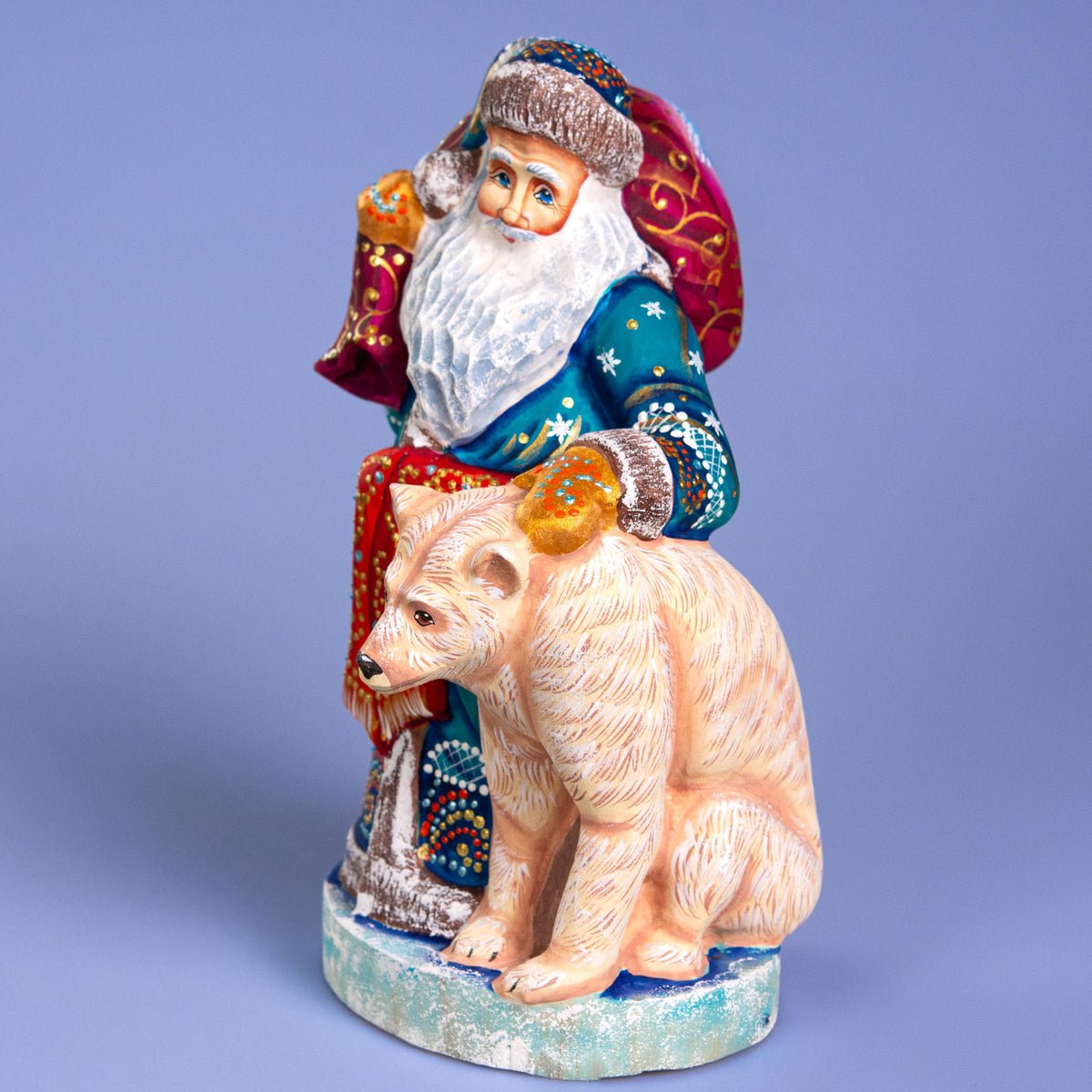 Blue Santa with Polar Bear Cub, 9" Hand Carved Wooden Figurine