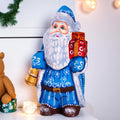 Blue Father Christmas figurine 5.5" with gold bell and stacked gifts