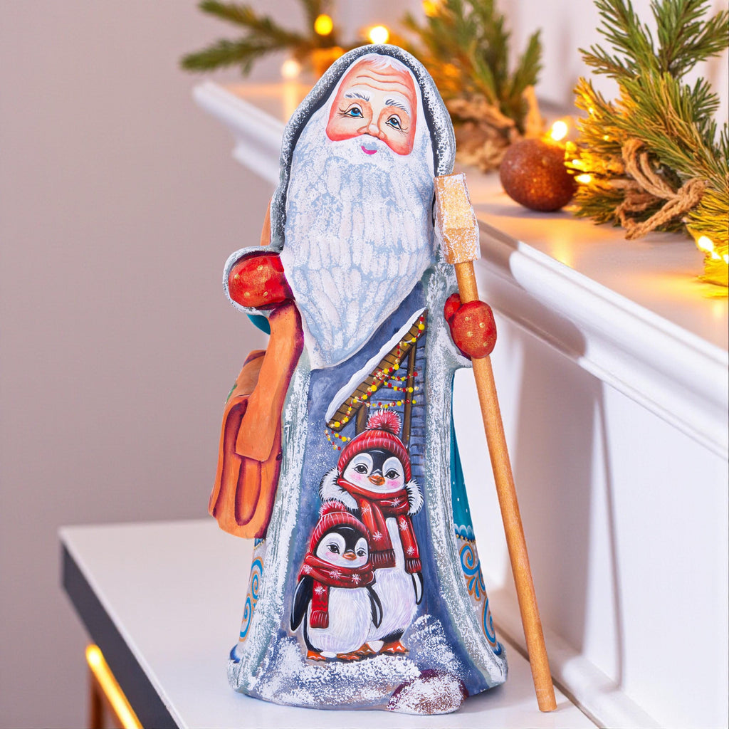 Kris Kringle solid wood figurine 9 inch, teal robe penguins, shelf decor