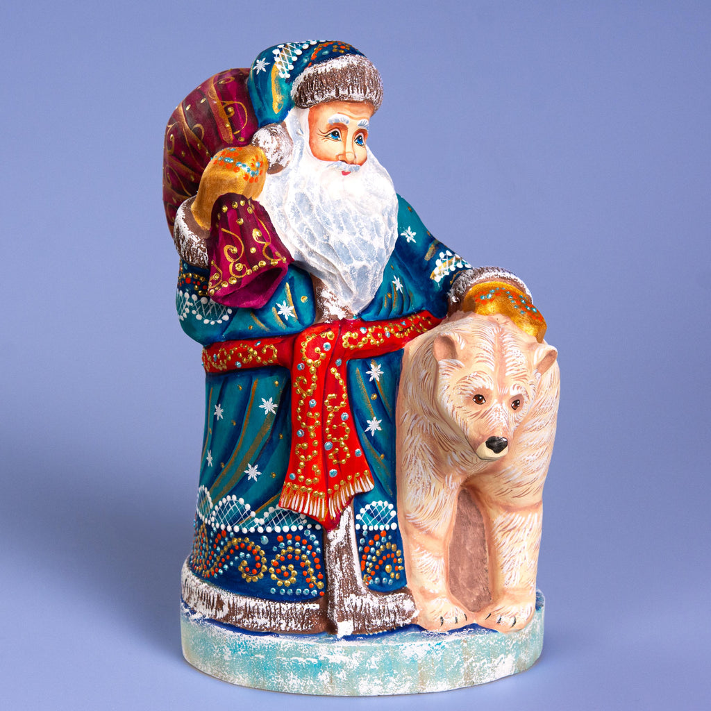 Blue Santa with Polar Bear Cub, 9" Hand Carved Wooden Figurine