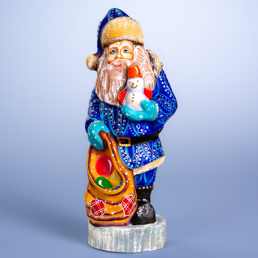 Hand carved blue Santa wooden figurine 10 inch, snowman in hand