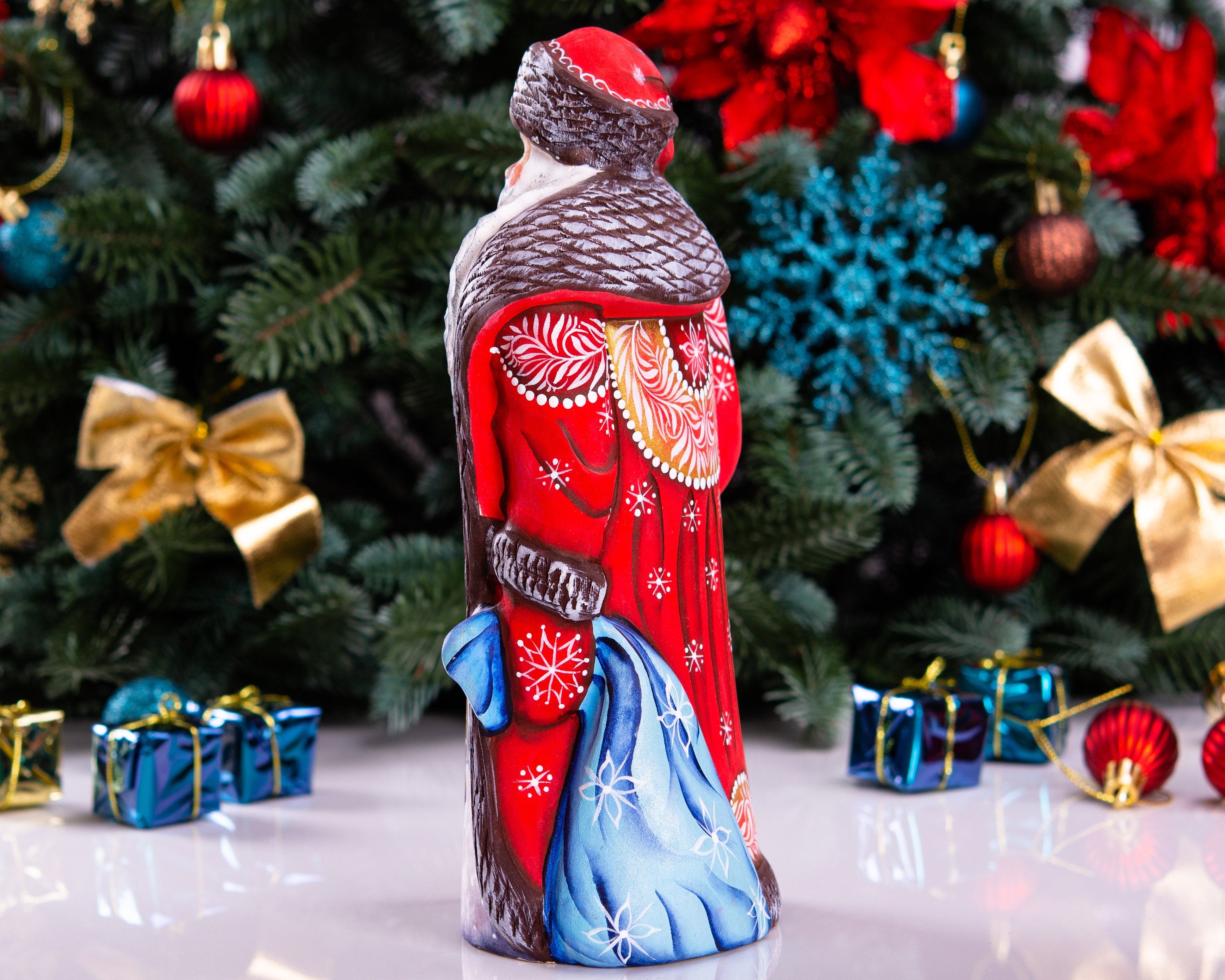 Hand carved wooden Santa figurine 9.5 inch, boy with sled, Christmas mantel decor