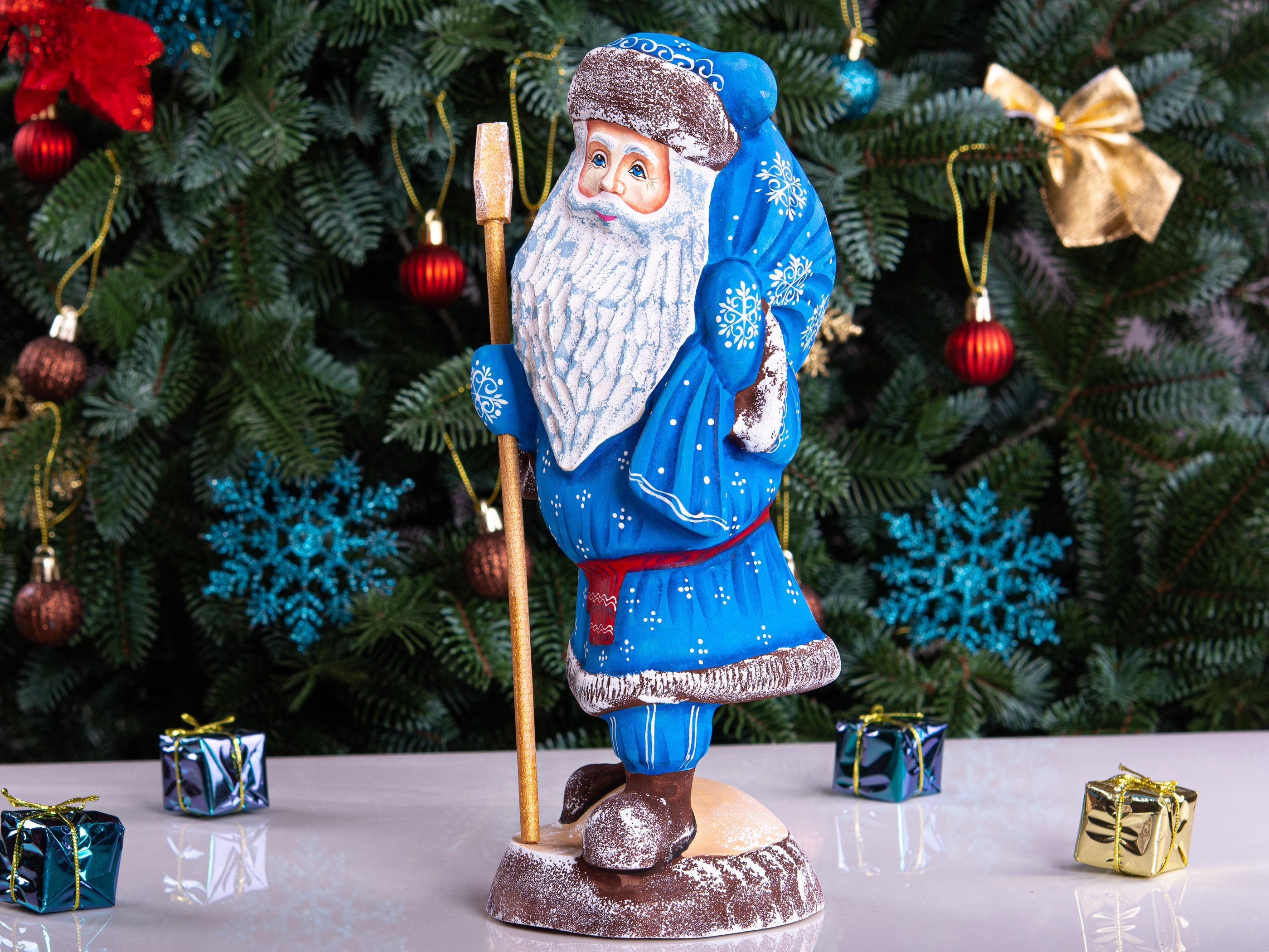 Hand carved blue Santa figurine 11 inch, gift sack, mantel decor