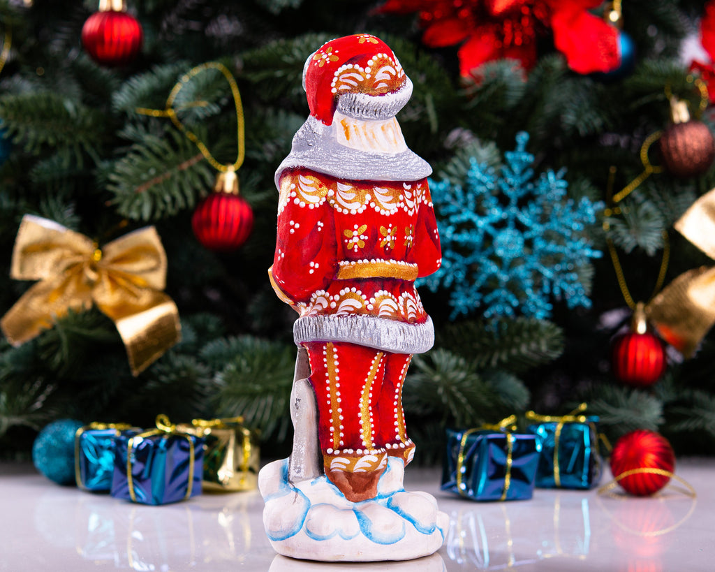 Santa Figurine 7.1″, Hand‑Carved Wood, Snow Shovel, Gold Accents