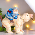 Old World Santa Riding Bear Figurine 9 inch Long, Hand Carved Wood