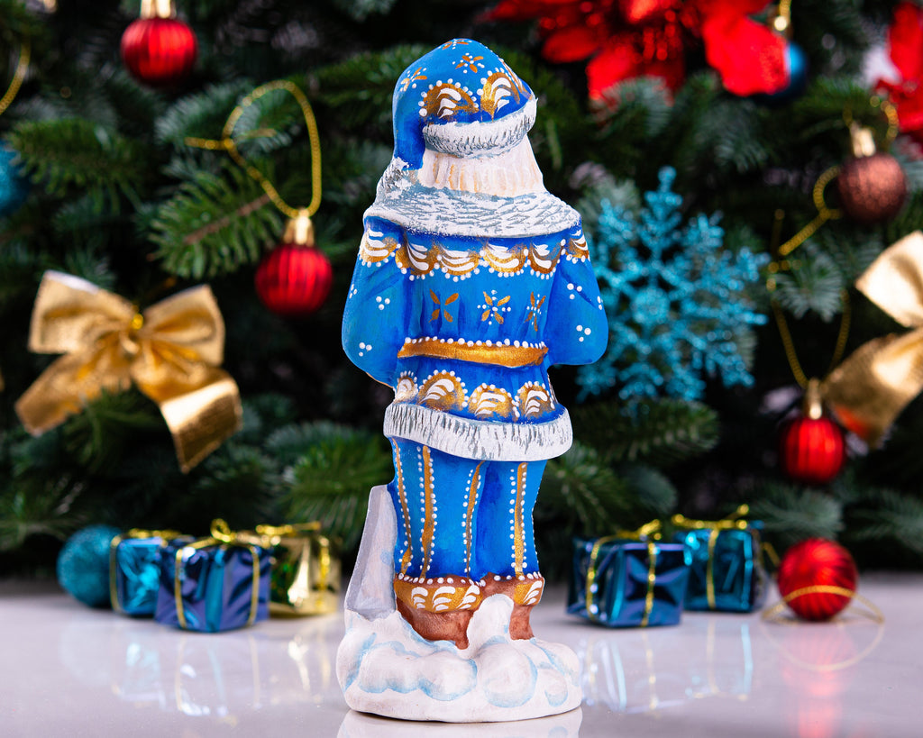 Father Christmas figurine with snow shovel in blue coat, 7.1 inch
