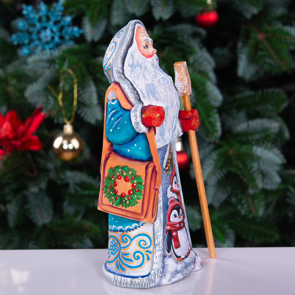 Kris Kringle solid wood figurine 9 inch, teal robe penguins, shelf decor