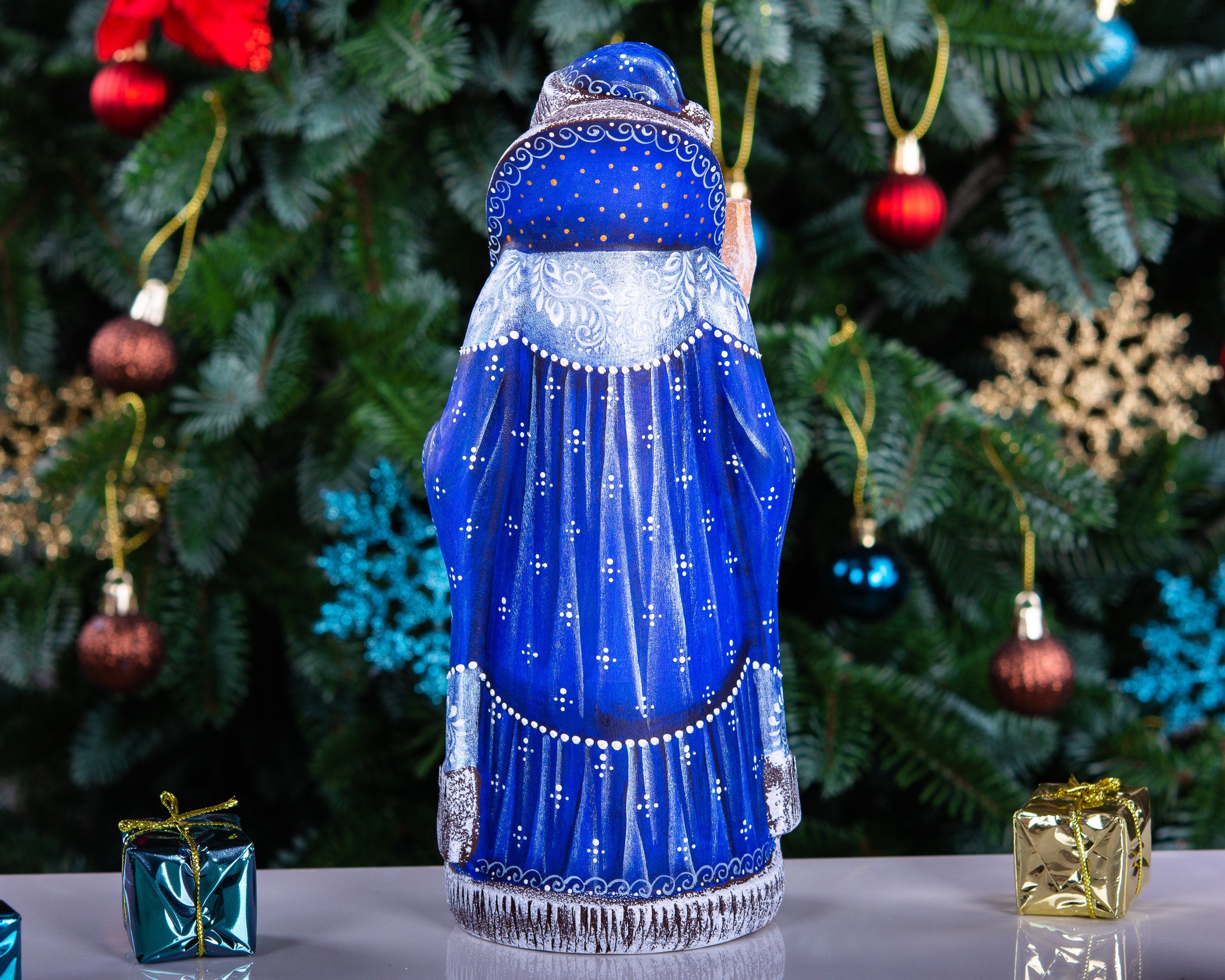 Hand carved wooden Santa figurine 9 inch, blue coat, winter landscape, holiday shelf decor