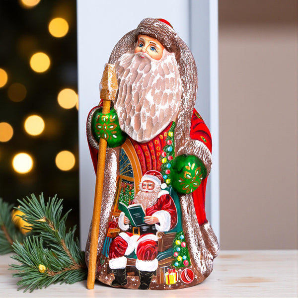 Santa Claus figurine 9.4 inch, folk art Santa reading by fireplace