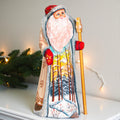 Hand carved wooden Santa figurine 9 inch, winter forest landscape, holiday shelf decor