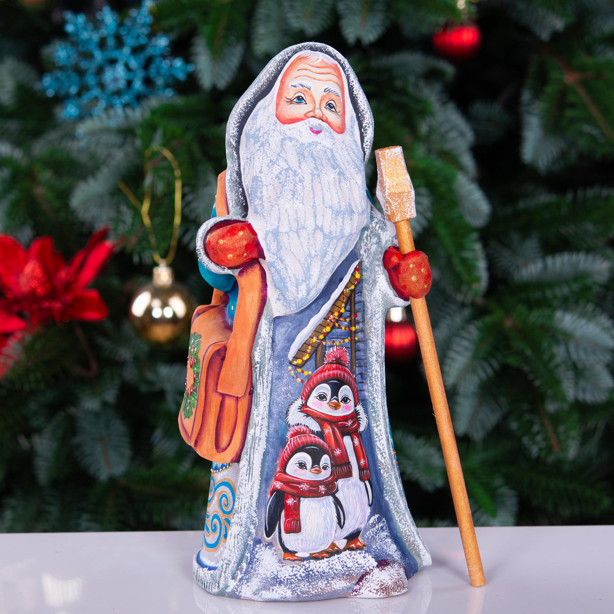Kris Kringle solid wood figurine 9 inch, teal robe penguins, shelf decor