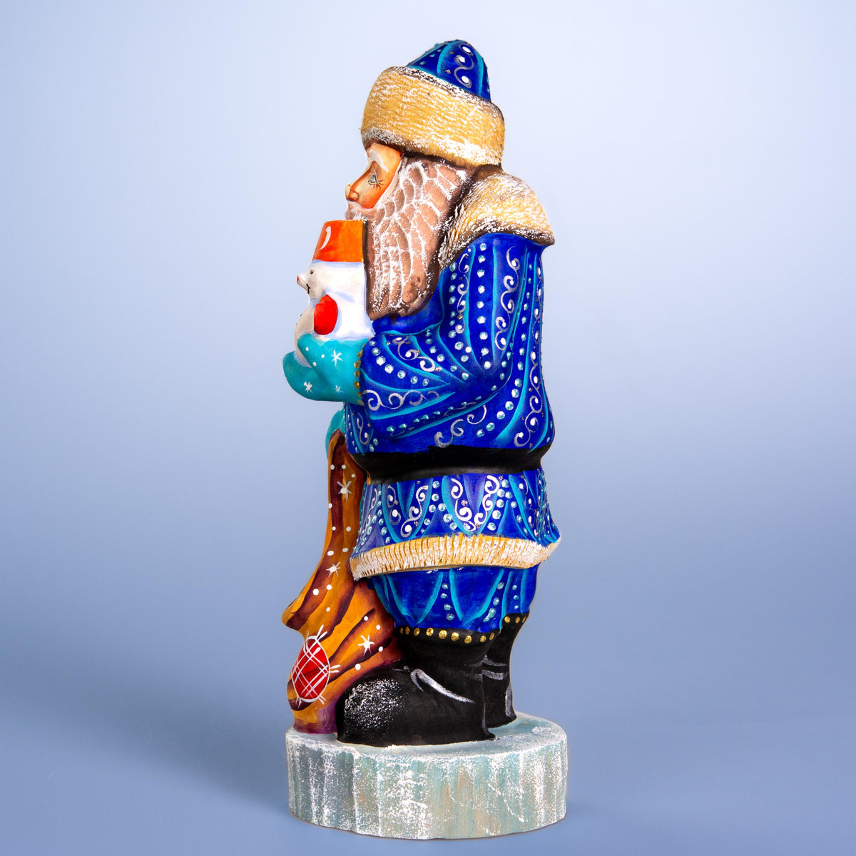 Hand carved blue Santa wooden figurine 10 inch, snowman in hand