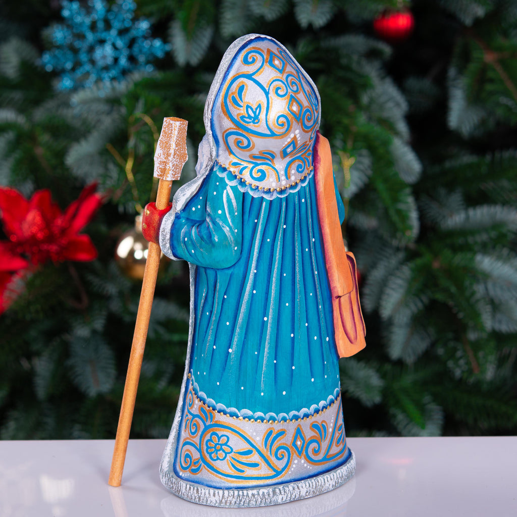 Kris Kringle solid wood figurine 9 inch, teal robe penguins, shelf decor