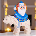 Old World Santa figurine riding polar bear, hand painted 6 inch