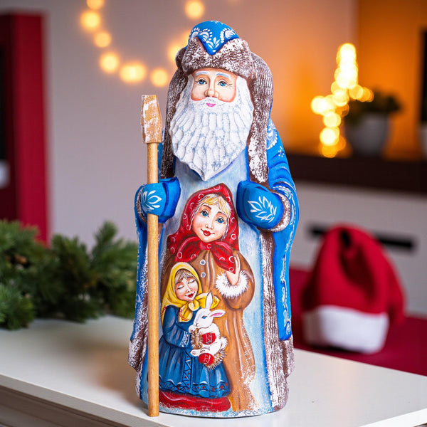 Wooden Santa figurine 9.1 inch, hand painted child scene, collectible Christmas mantel shelf decor