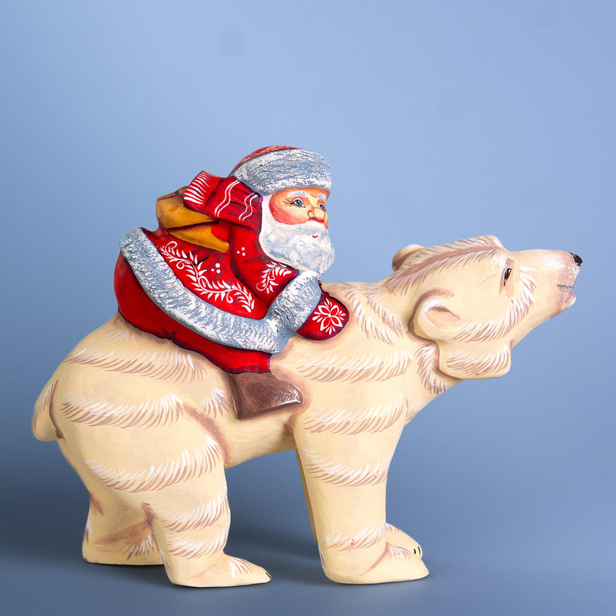 Hand-Carved Wooden Santa Riding Bear Figurine: Christmas Holiday Decor