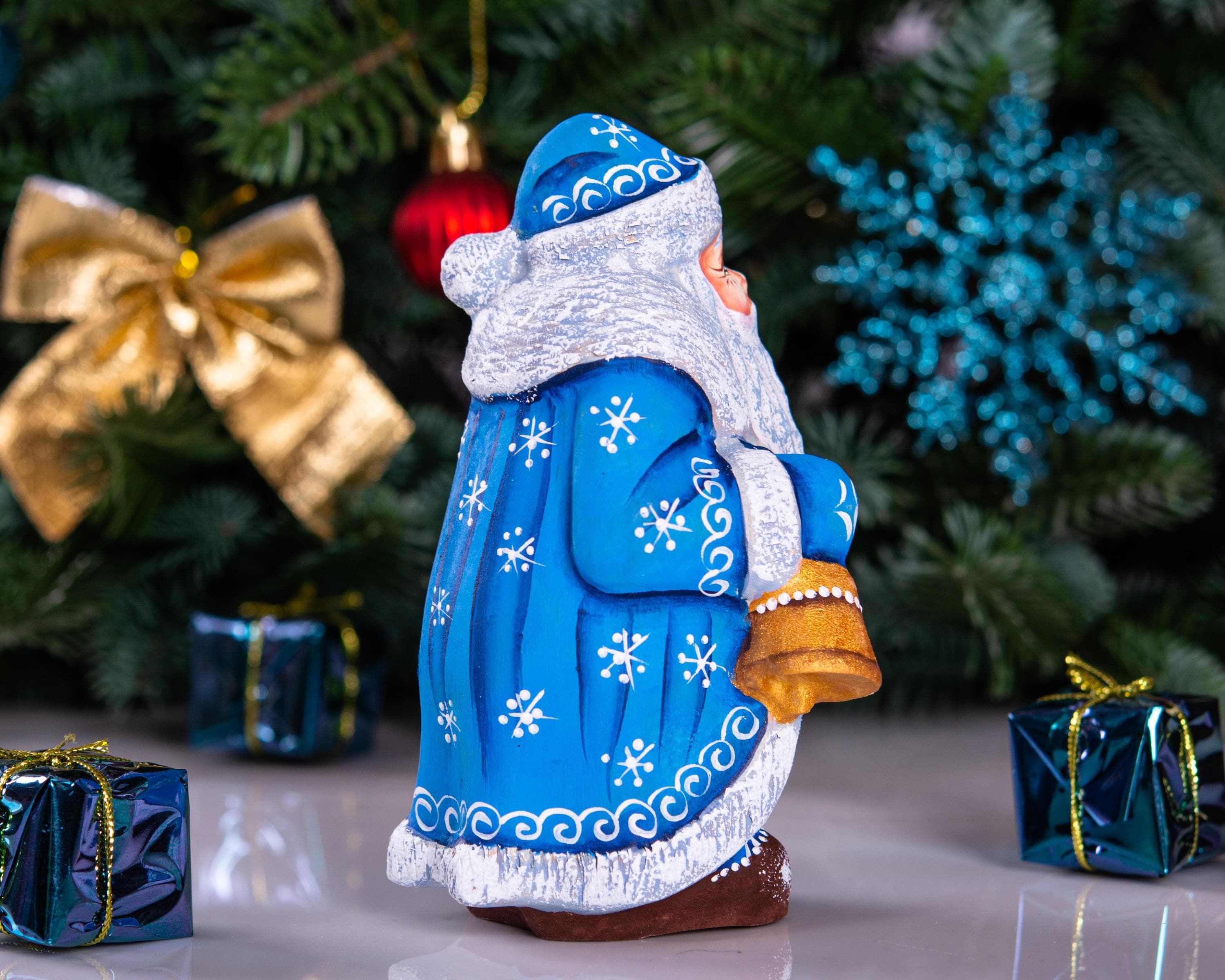 Blue Father Christmas figurine 5.5" with gold bell and stacked gifts