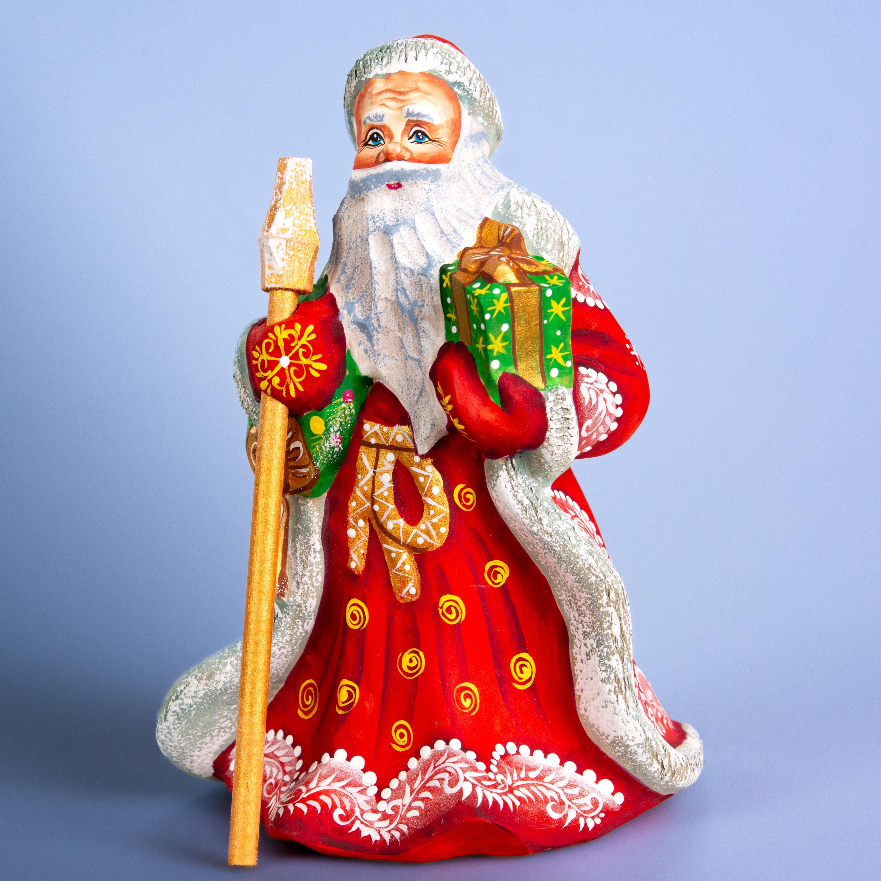 Father Christmas wooden figurine 7 inch, gift in hand, tabletop centerpiece, folk art
